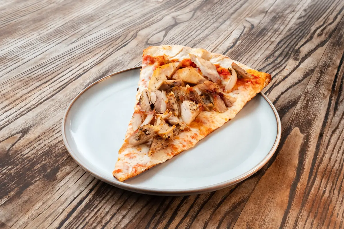 Chicken gyro pizza slice